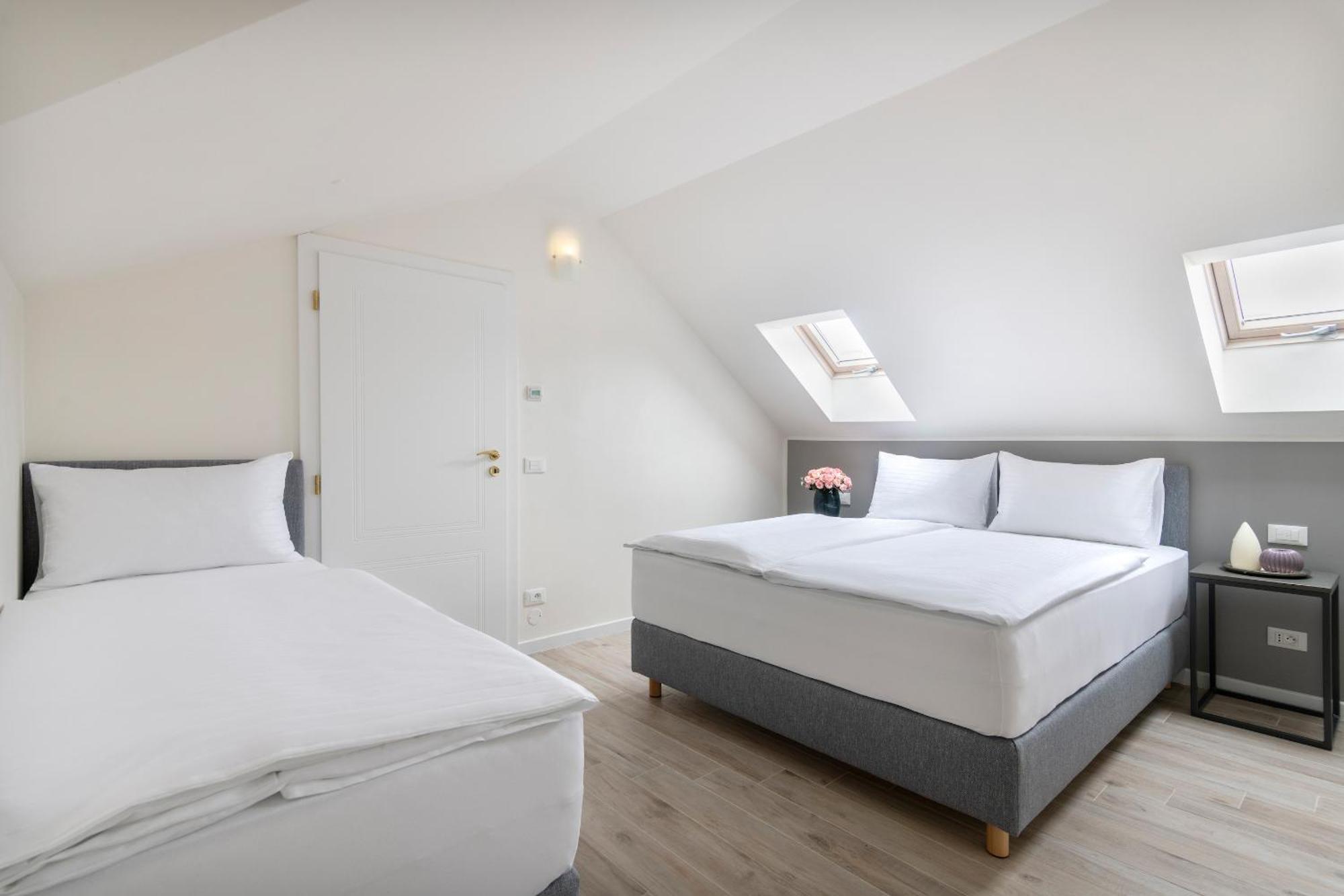 Kinsky Garden Apartments And Suites By Dwellfort Praga Quarto foto