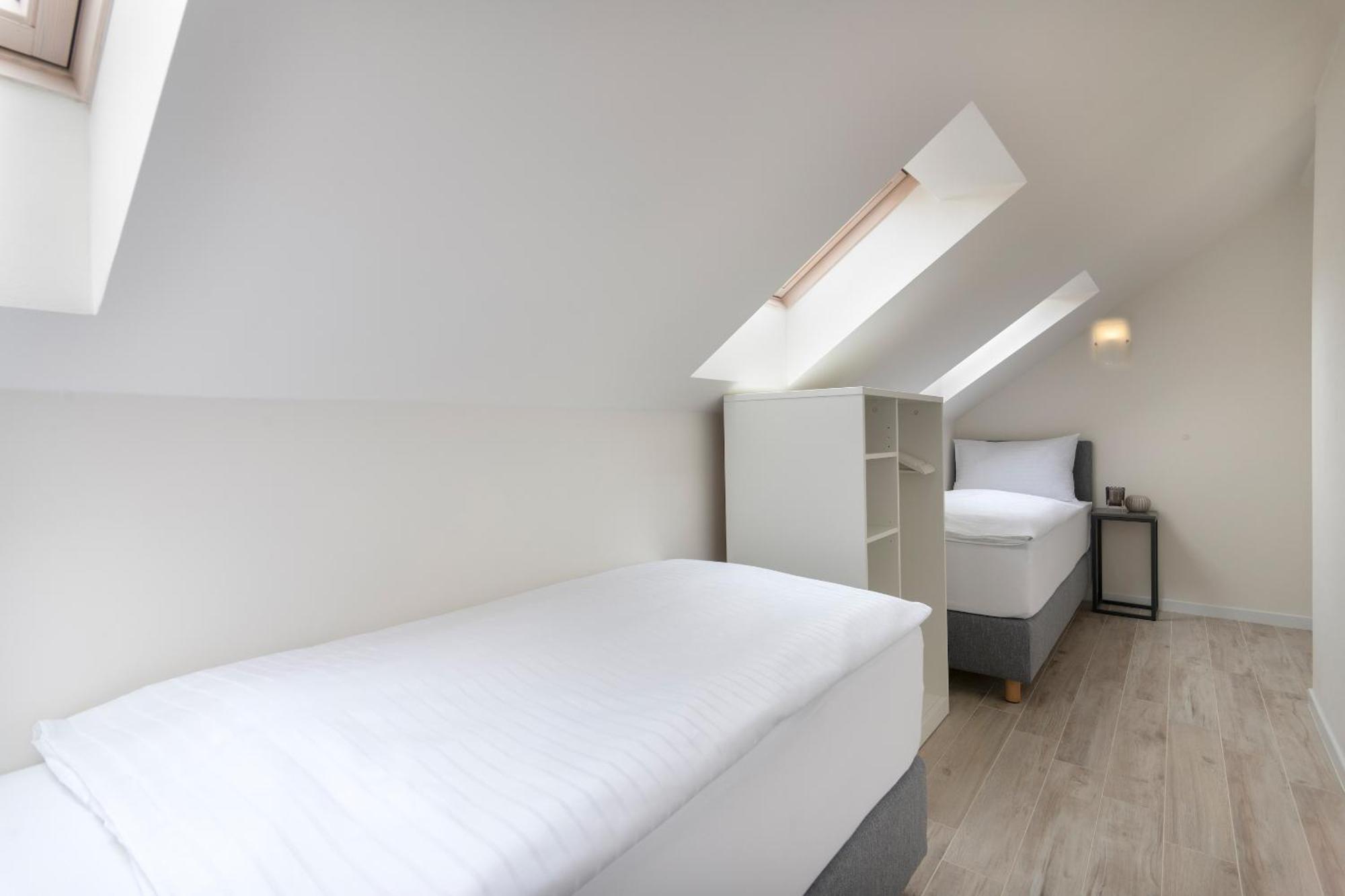 Kinsky Garden Apartments And Suites By Dwellfort Praga Quarto foto