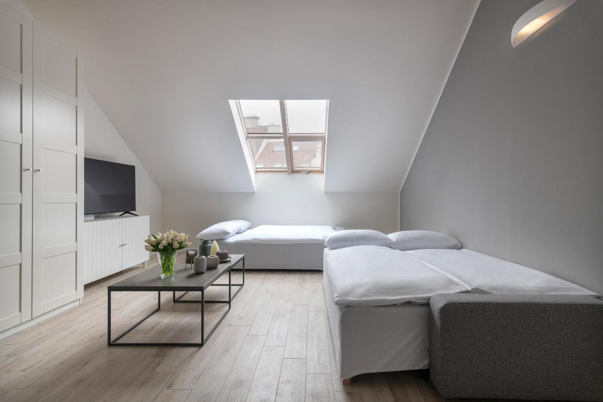 Kinsky Garden Apartments And Suites By Dwellfort Praga Quarto foto